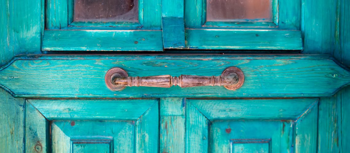 beautiful door handle on old wooden door